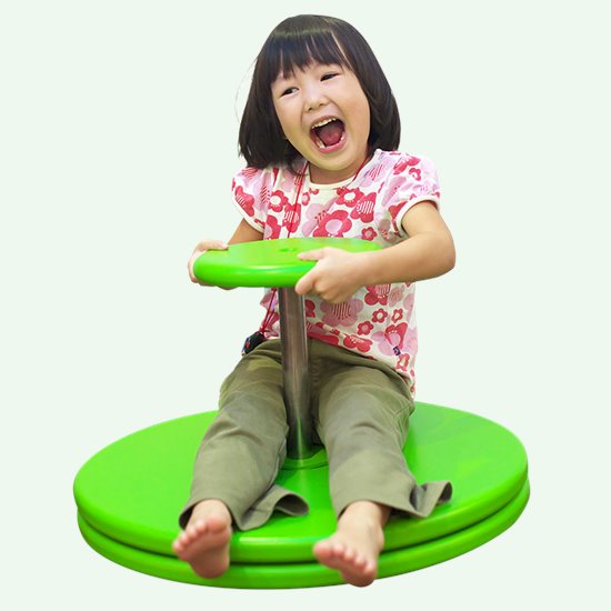 Girl on rotating platform