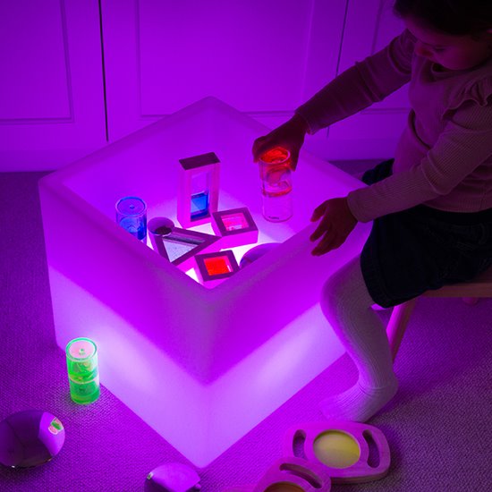 A light up cube wit inset tray
