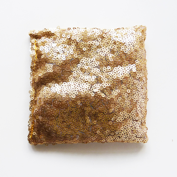 Sequin cushion