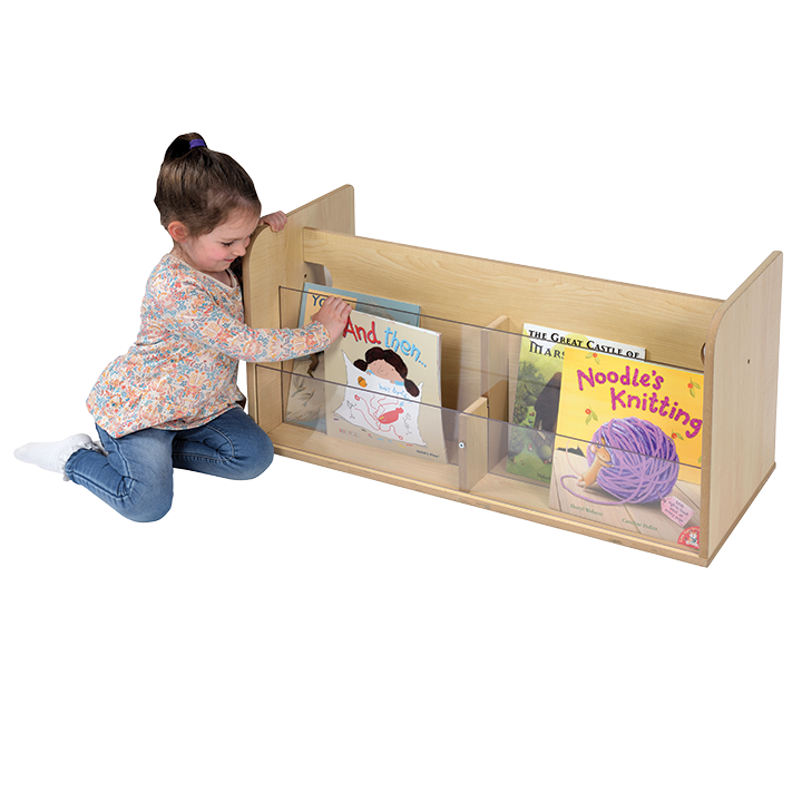 Little girl choosing her own book