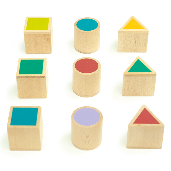 Three sets of three game pieces