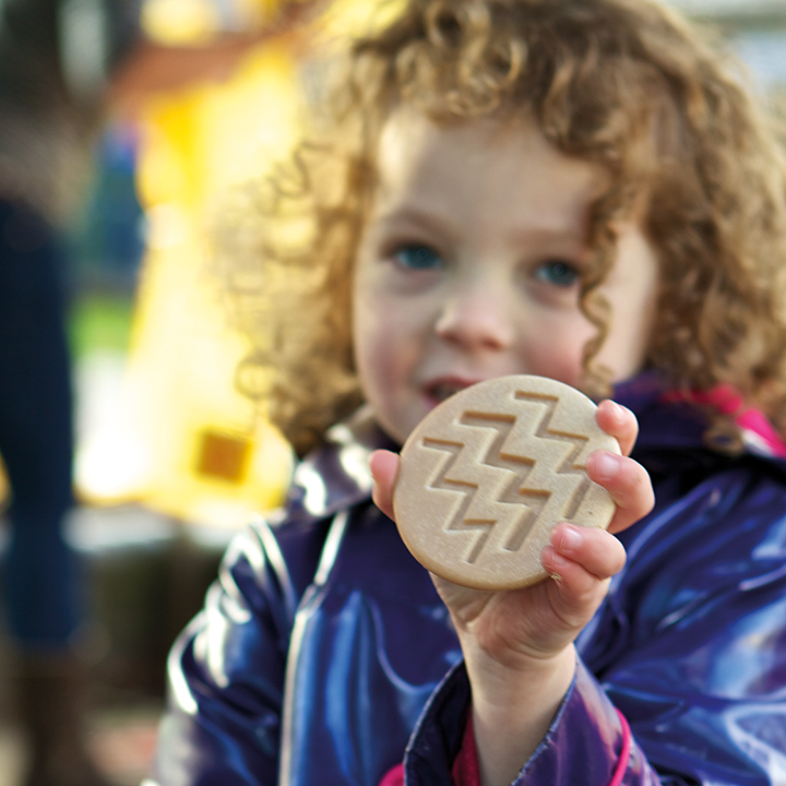Cute child with sensory stone