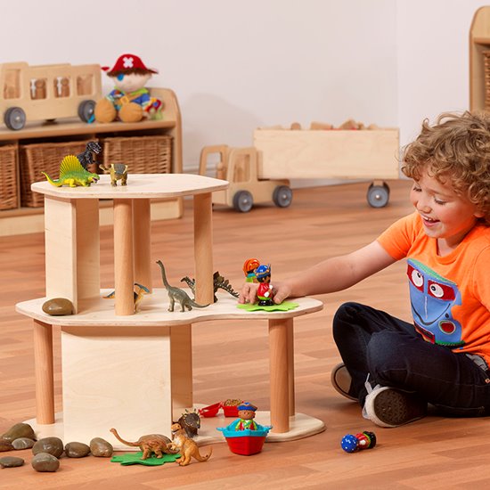 Child playing with multi-use building