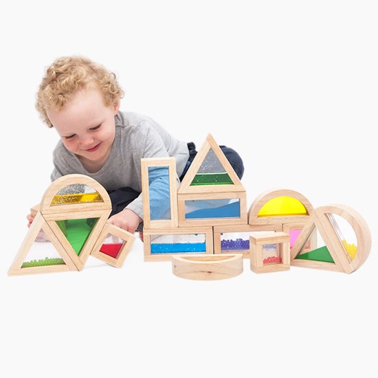 Child playing with varied sensory blocks