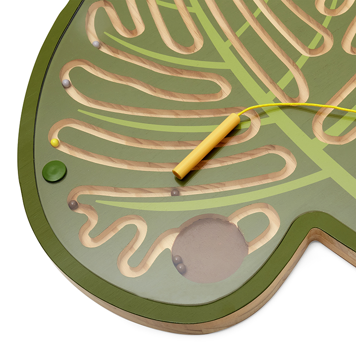 Close up of magnetic wand and maze