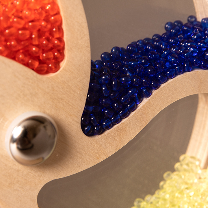 Beads in a wooden wheel