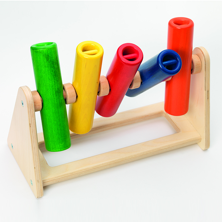 Five colourful, rotating tubes on a wooden stand