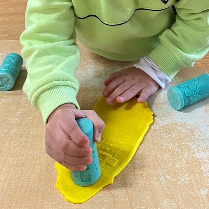 Stamping into play dough