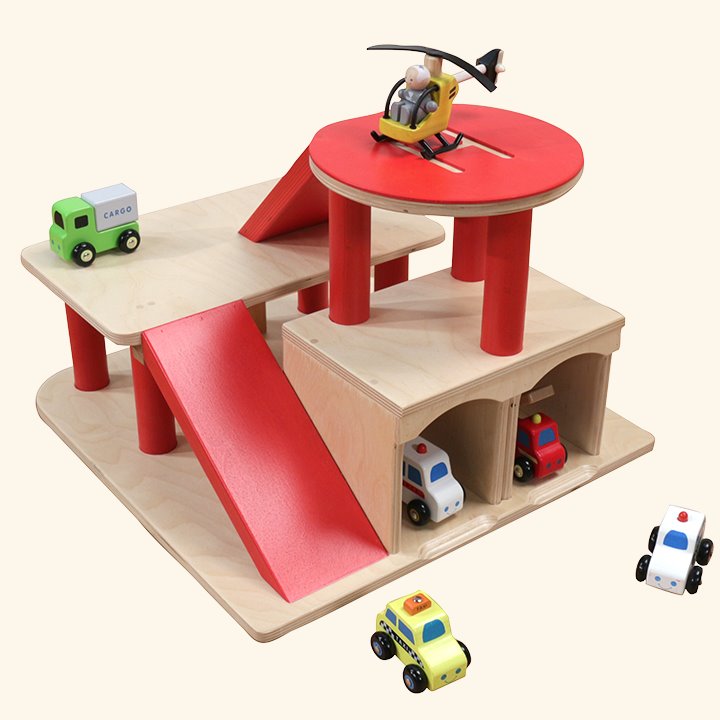Wooden play garage with role-play features