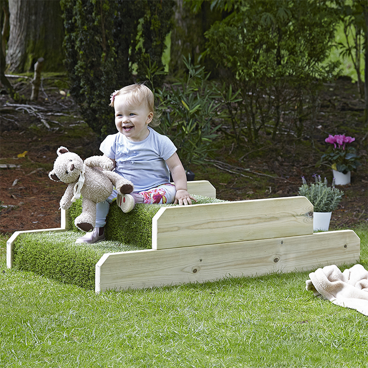 Child in garden Ramp on one side and steps on the othe