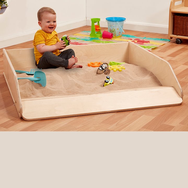 Birch plywood crawl-in sandpit with ramp and tilted edge