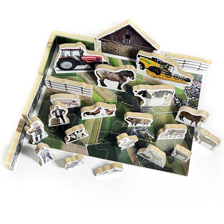 Puzzle with small world farm figures.