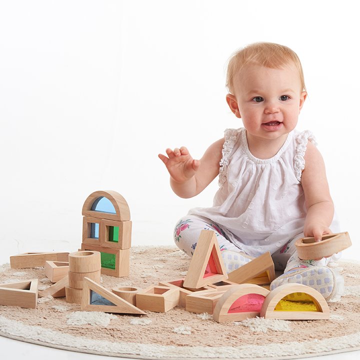 Baby playing with 24 Rainbow Blocks for sorting, matching, and construction