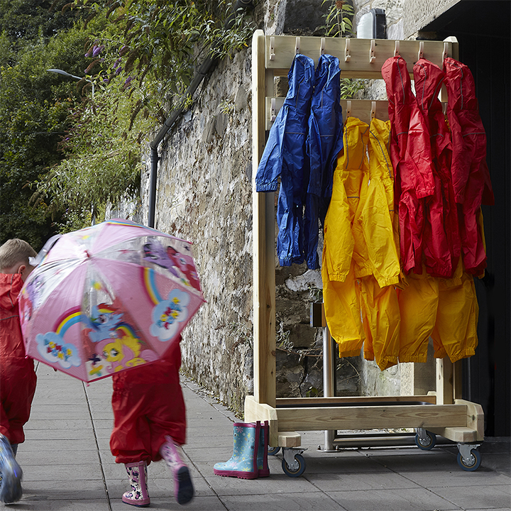 Hang 32 rain suits on wooden rack