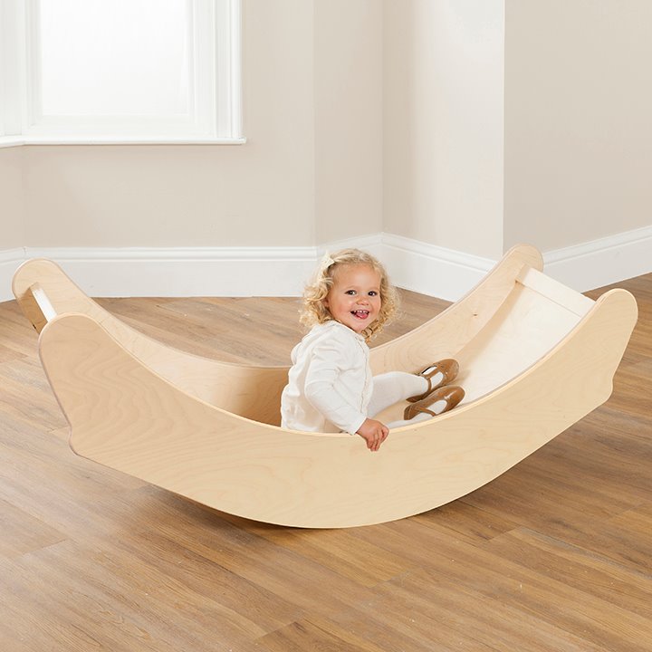 A 3-in-1 multi-use slide with steps, rocking boat or countertop