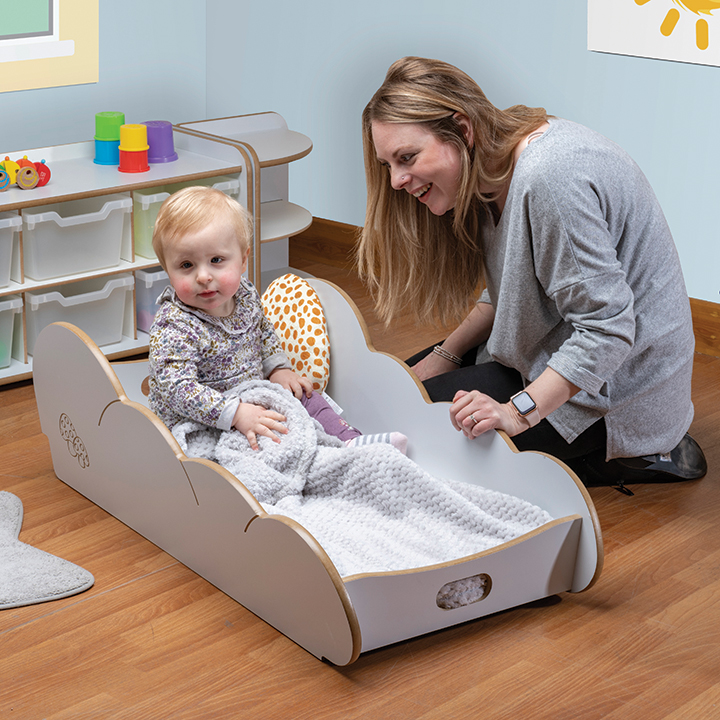 Pastel coloured nap cloud with mattress and bedding