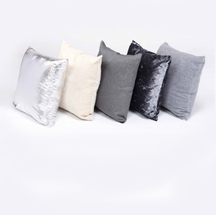 Set of 5 cushions lined up against one another