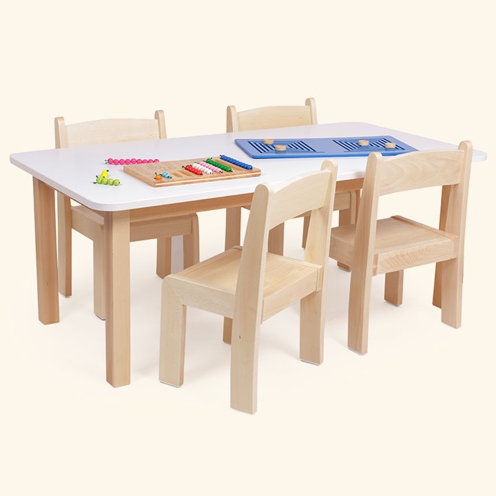 Rectangular laminate topped table with 4 chairs
