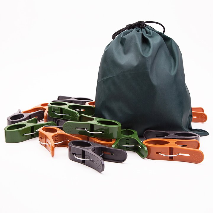 Camo coloured pegs and black drawstring bag