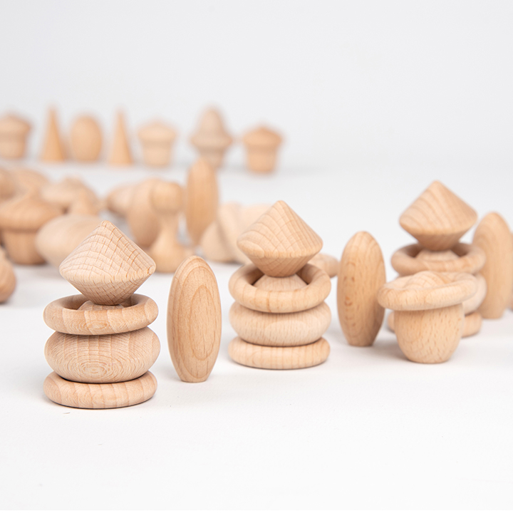 Wooden treasure pieces piled up in shapes
