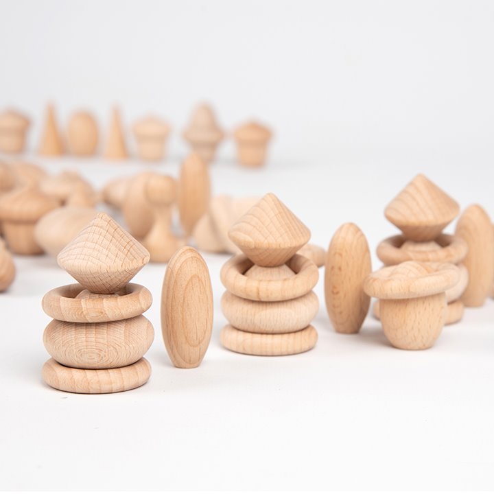 Wooden treasure pieces piled up in shapes
