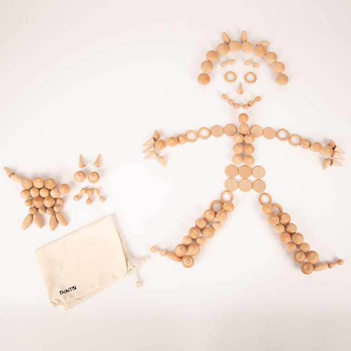 Treasure pieces sorted into stick-man shape on floor