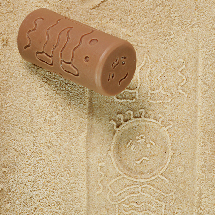 Rollers making marks in sand