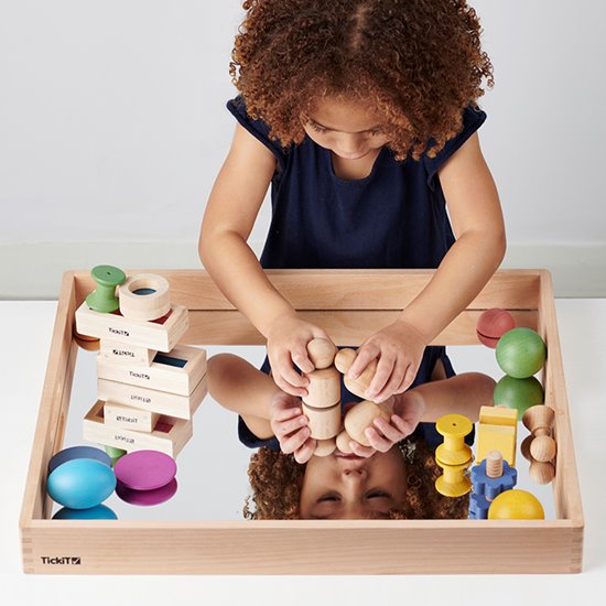 Child playing with Wooden tray with acrylic mirrored base