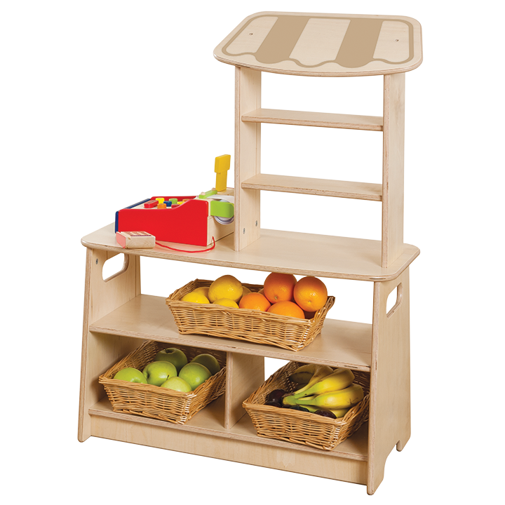 Market stall set up with pretend fruit, veg and baskets