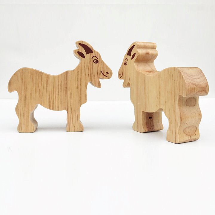 Couple of wooden goats