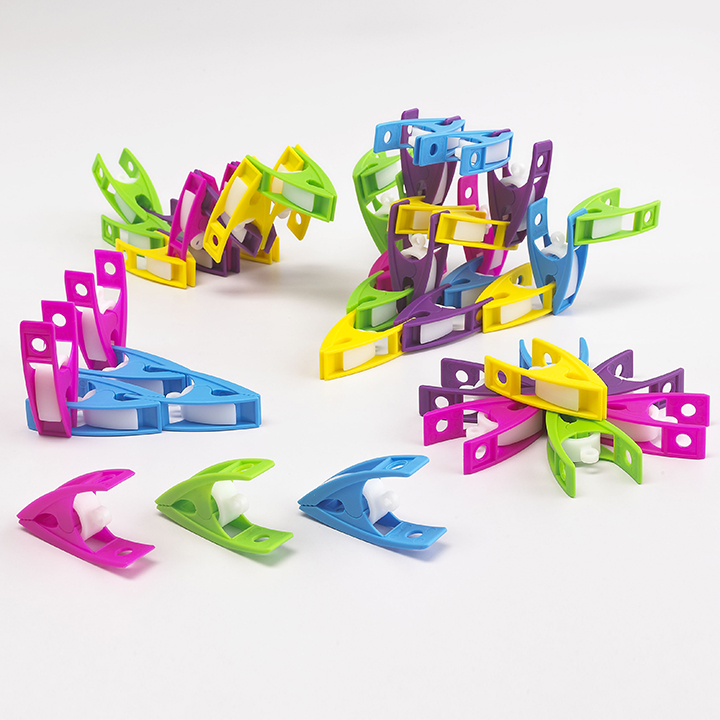 Colourful pegs arranged in different shapes