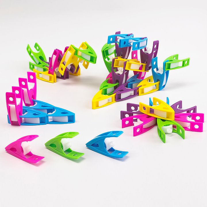 Colourful pegs arranged in different shapes