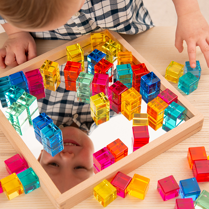 Acrylic blocks in a mirrored tray