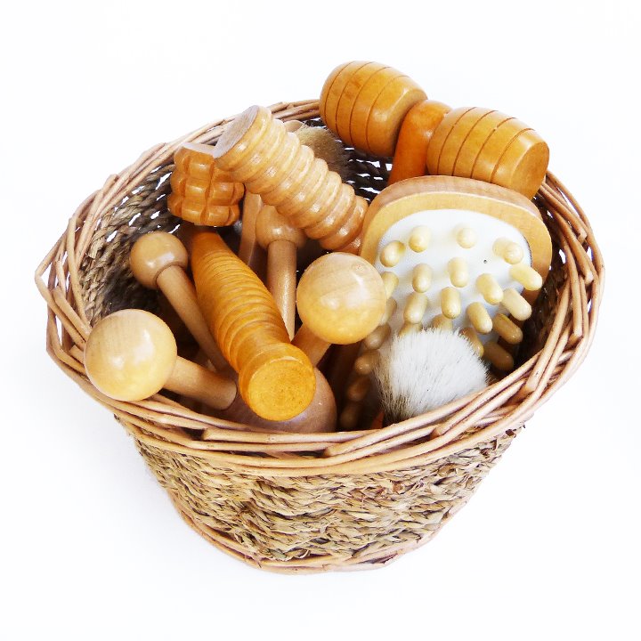 Basket of wooden massage tools