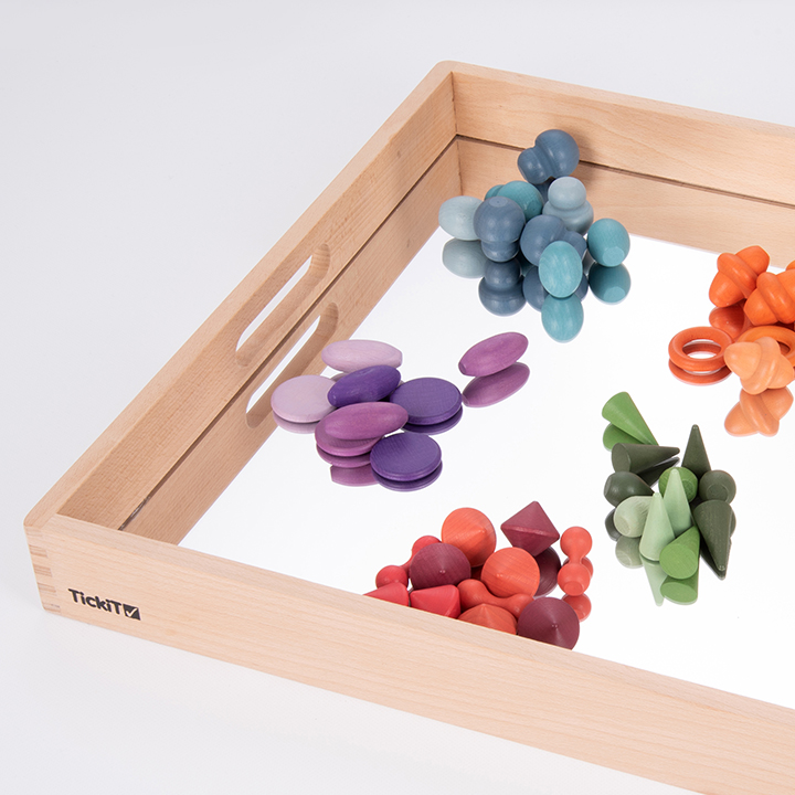 Pebbles on Wooden tray with acrylic mirrored base