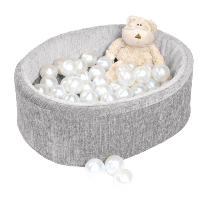 Grey snuggly den with a teddy bear and plastic balls