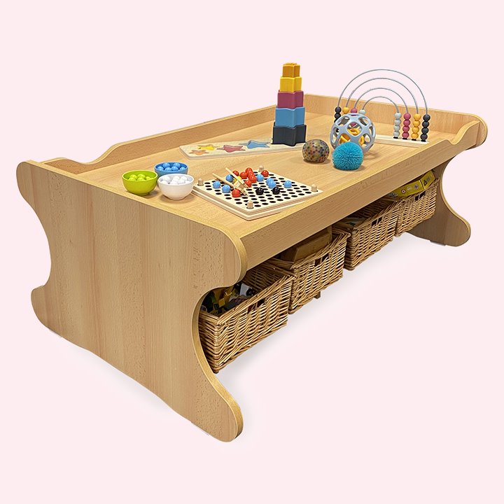 Wicker baskets under wooden lipped play table