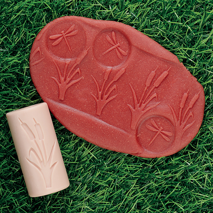 Rollers make patterns in dough