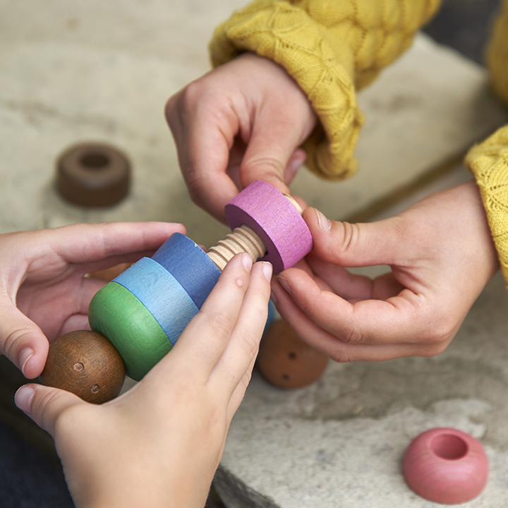 Fingers working to create a colour combination