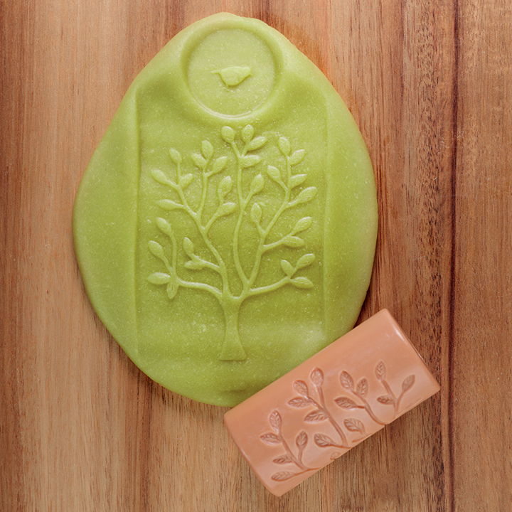 Make marks and stamp shapes into dough