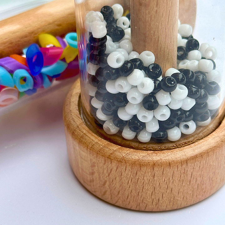 Black and white beads in a rattle