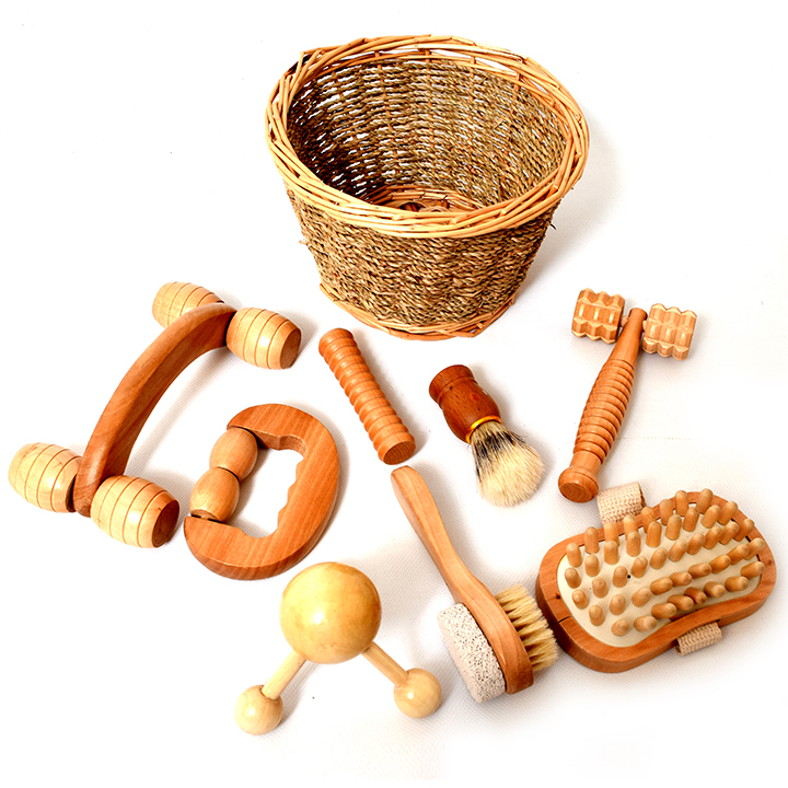 Wooden massage tools laid out on the floor
