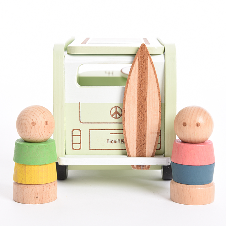 People and Surf board in a Campervan