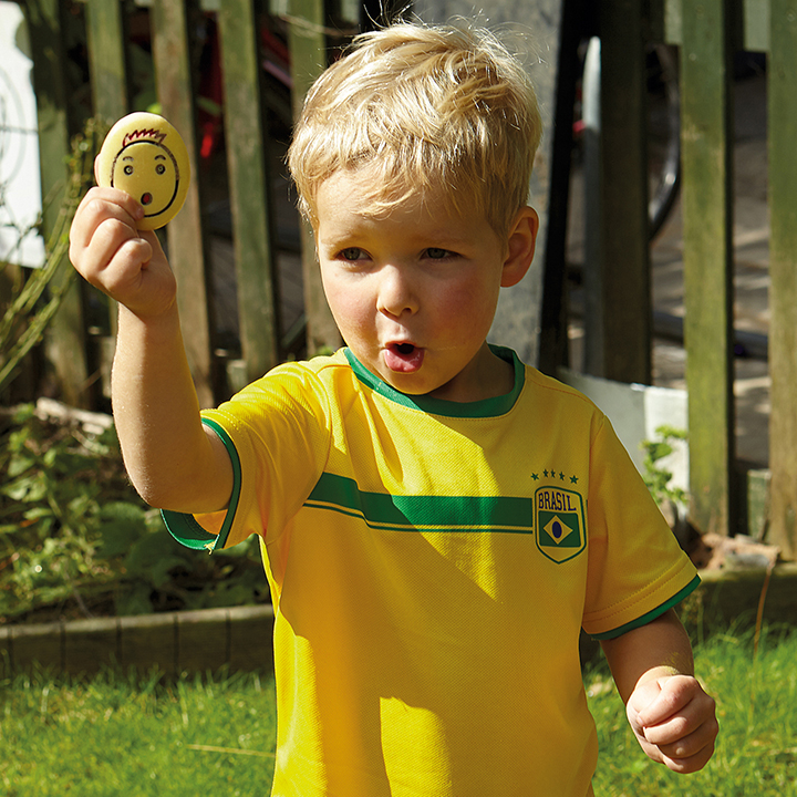 Little boy imitating funny face