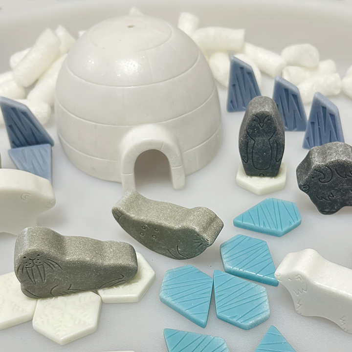 Polar creatures and igloo scene