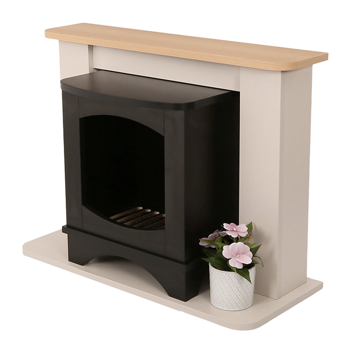 Pretend wood burning stove in fireplace surround