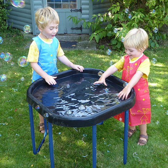 Children playing with tuff trays