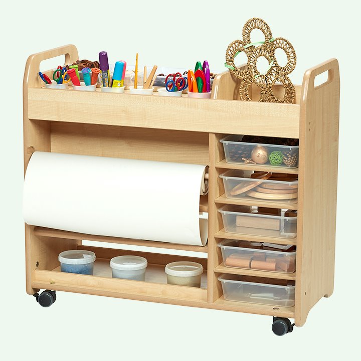 Wooden trolley with compartments filled with arts and craft supplies