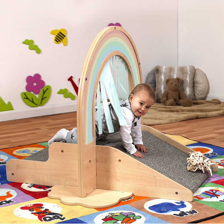 Babies moving and exploring through a rainbow