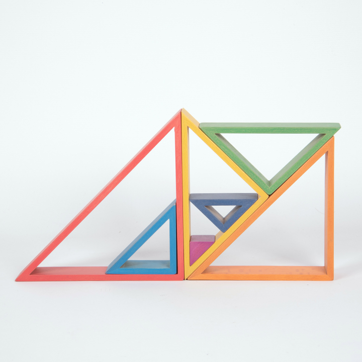 Seven colourful wooden shapes. A great STEM addition.